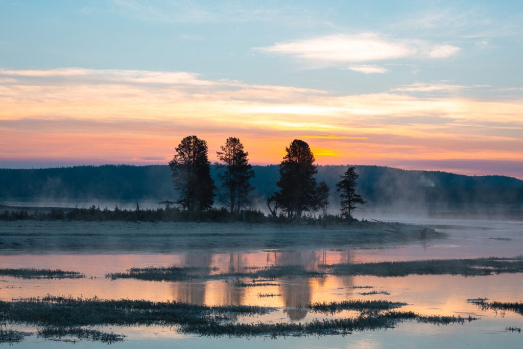 Sunrise over Hayden Valley and Yellowstone River at Alum Creek in Yellowstone National Park